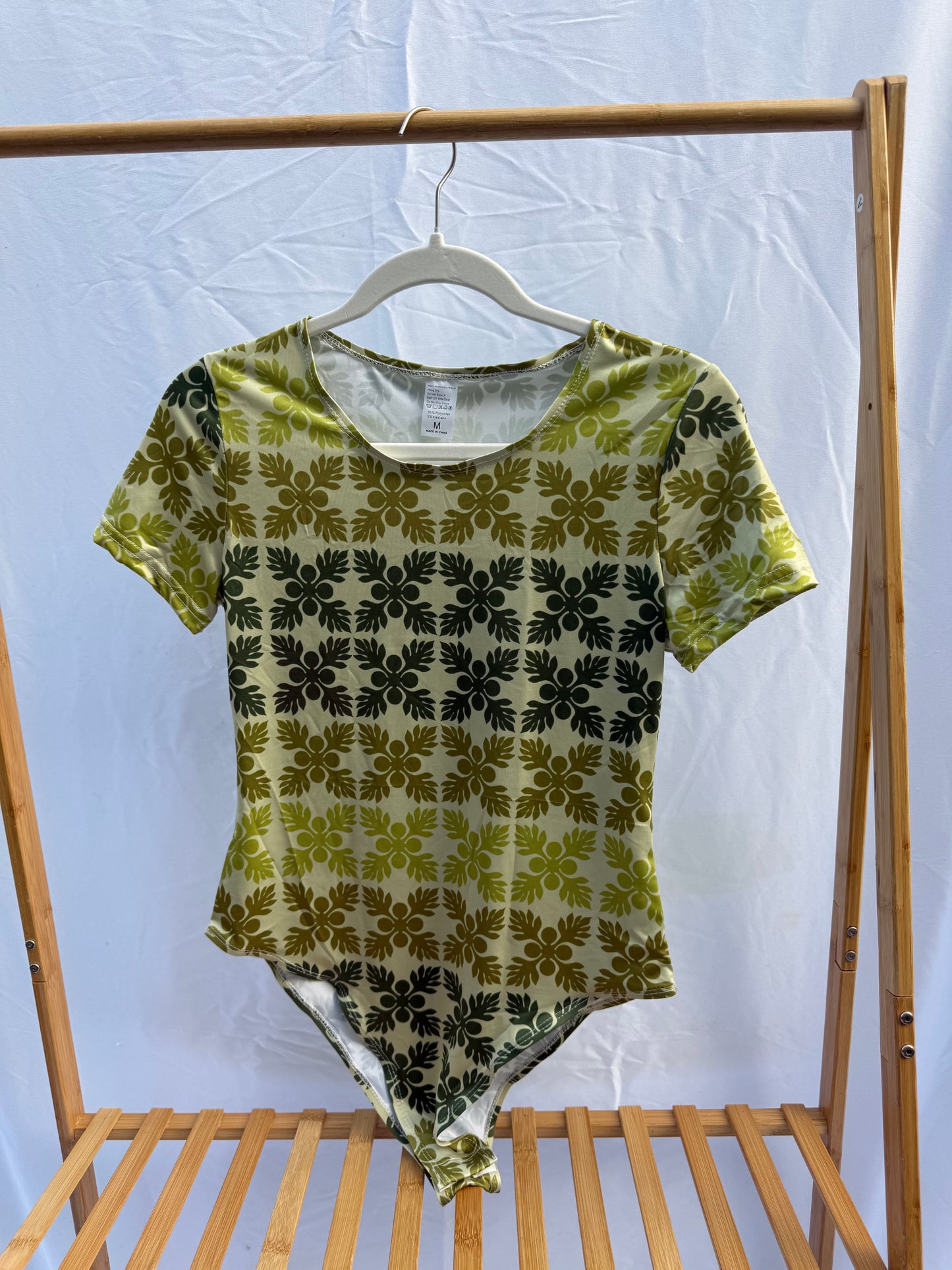 Green Kuiki bodysuit