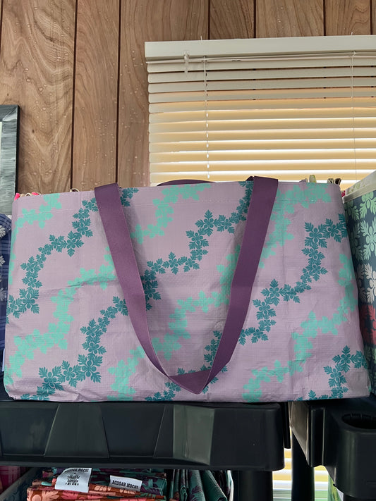 Lavendar + seafoam lei kuiki bebe bag